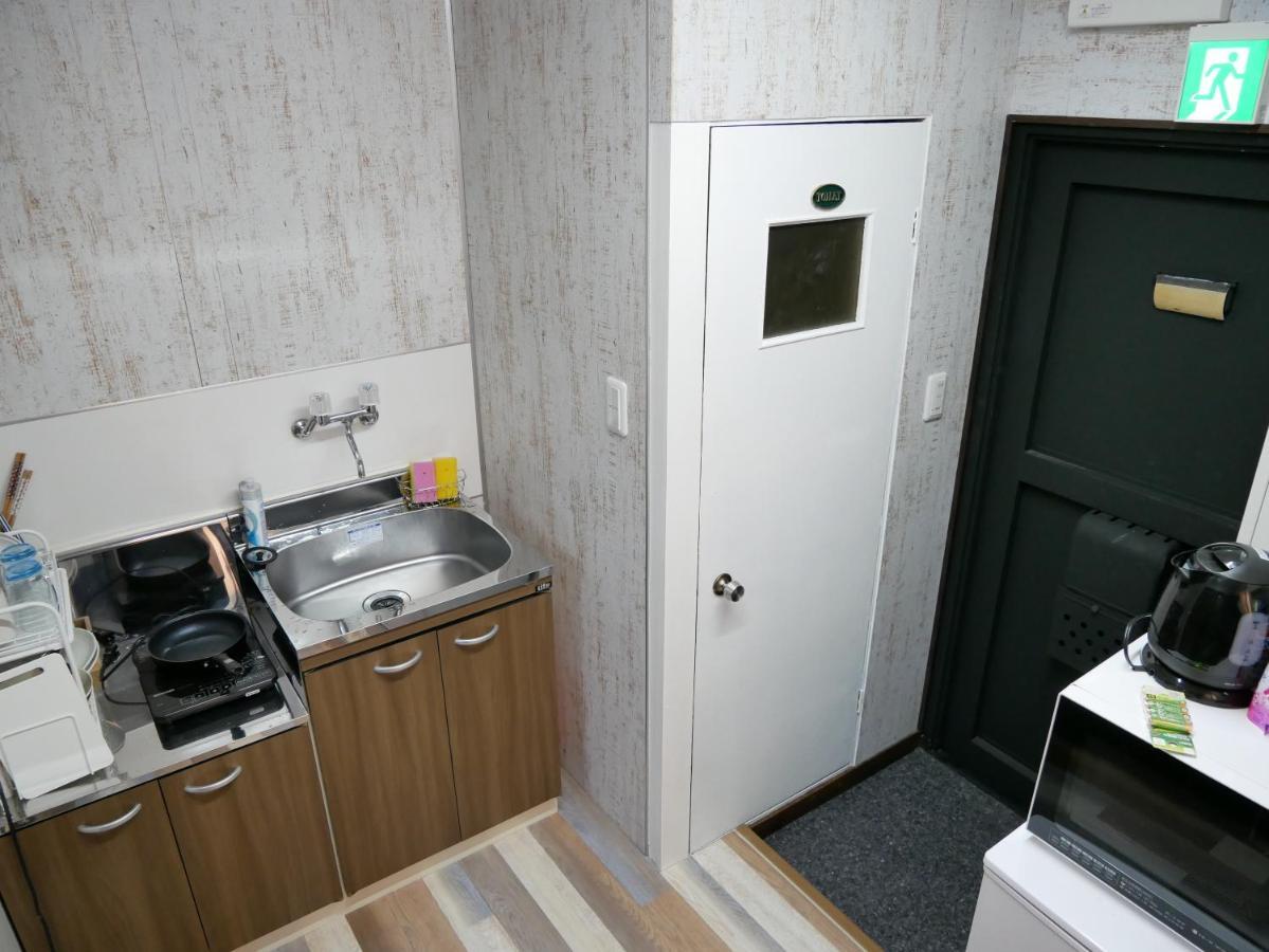 Guest House Kishinosato Осака Номер фото